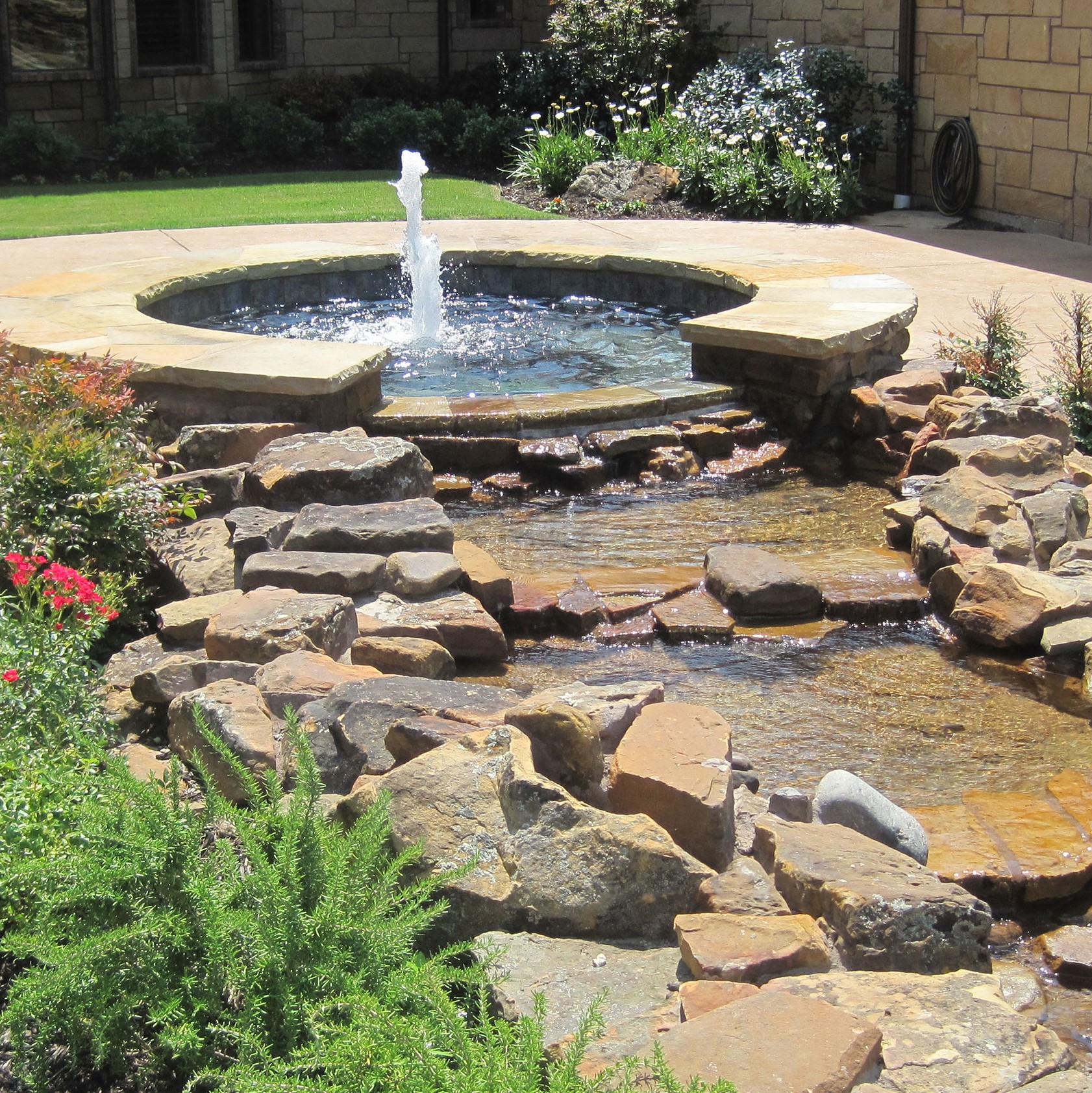 pool services for fountain and rock area in home.