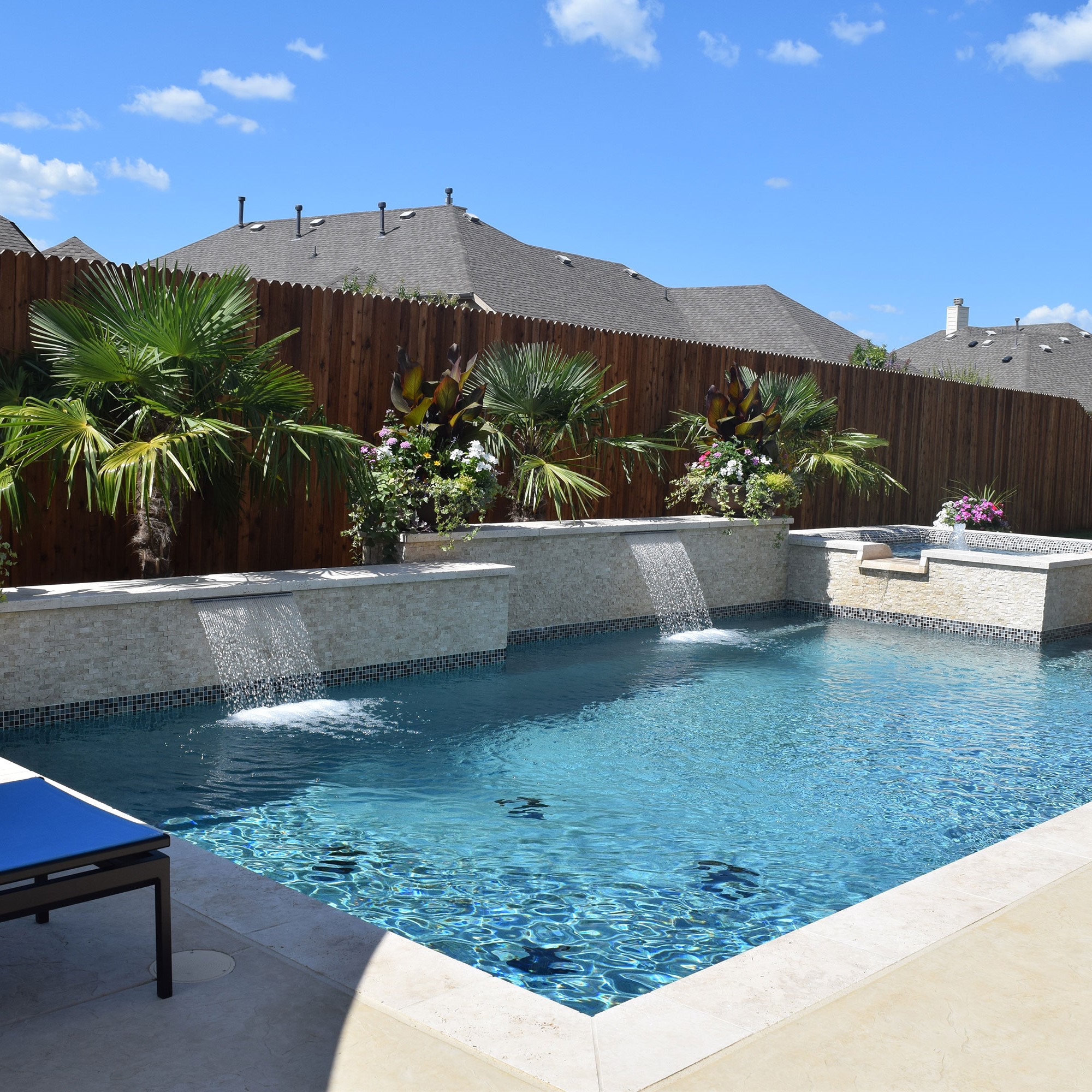 new pool installation with waterfalls